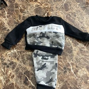 0-3 month camouflage outfit.